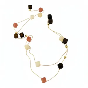 Elegant double-layer necklace with earthy acrylic square pendants for a chic vintage look.
