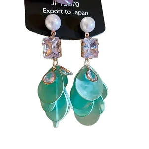 Green layered shell petal earrings with pearls and crystals for beach vacation
