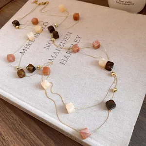 Detail of retro Maillard style double-layer necklace with square acrylic pendants