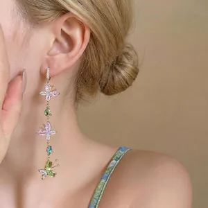 Elegant long tassel earrings with colorful zircon butterflies and teardrop stones.