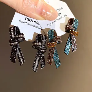Pendientes de botón vintage con lazo y diamantes de imitación, diseño de lujo