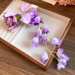 Romantic purple fabric flower hair clip with delicate tassels for vacation style