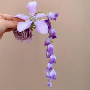 Purple fabric flower hair clip with long floral tassel for women's vacation hair accessory