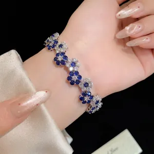 Elegant floral zircon bracelet featuring sparkling blue and white gemstones for women