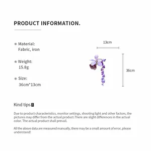 Detail view showing dimensions and specifications of the purple fabric floral tassel hair clip.