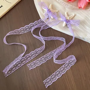 Elegante molletta per capelli in pizzo viola con stella marina e lunghe nappe set da 2
