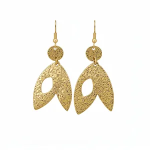 Exquisite golden textured leaf pendant hook earrings for women with a simple fashion design.