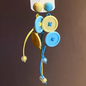 Boucles d'oreilles pompon bouton dopamine en jaune et bleu style d'été