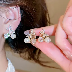 Elegant 18k gold plated butterfly ear clips with zircons and pearls, non-pierced design.