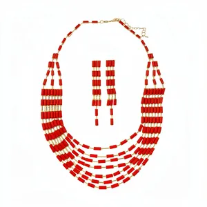 Retro multi-strand bib necklace and drop earring set featuring red rectangular beads