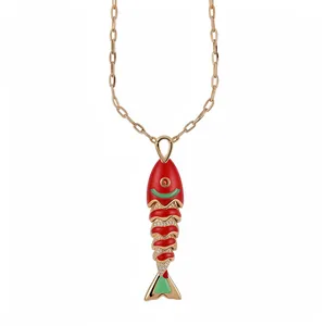 Stainless steel necklace with red and green enamel fish pendant in gold finish