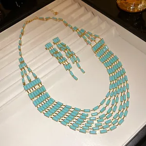 Vintage palace style turquoise rectangular necklace and earrings set in gold