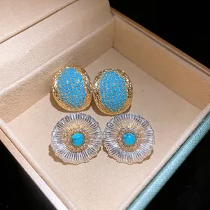 Exquisite vintage style oval and floral earrings with turquoise accents in a jewelry gift box