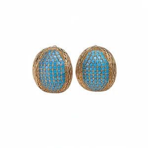 Vintage gold-tone oval stud earrings featuring pavé turquoise blue zircon stones