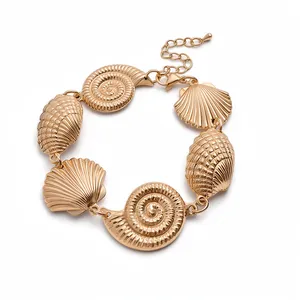 Vintage gold metallic seashell and ammonite link statement necklace for fashion jewelry