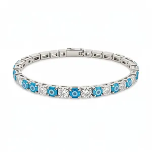 Elegant silver evil eye bracelet featuring clear zircon stones and blue nazar charms