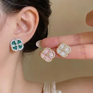 Boucles d'oreilles fleurs géométriques élégantes avec zircons et aiguilles en argent