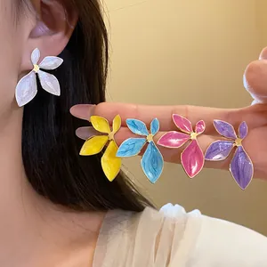 Detailed close-up showing five colorful oil-drop flower stud earrings with S925 silver needles