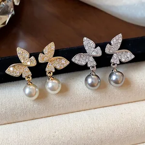 Elegant 18k gold and silver plated butterfly stud earrings with pearl drop for women