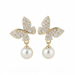 Elegant 18k gold plated butterfly drop earrings with white pearls and crystals