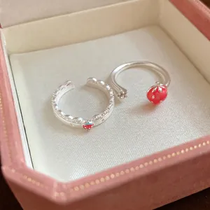 Romantic silver-tone strawberry and star open ring set featuring red enamel details