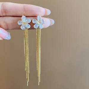 Elegant 18k gold plated zircon flower tassel earrings with long chain dangles detail