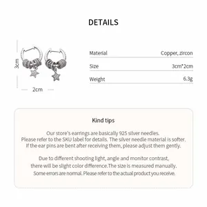 Detail view of zircon star hoop earrings with material and size specifications