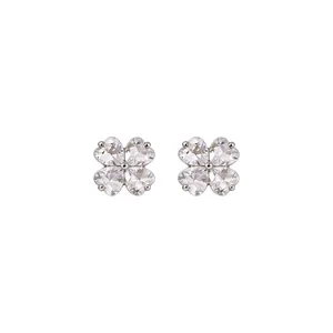 Elegant zircon flower stud earrings with a four-leaf clover design in silver finish.