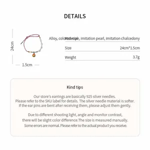Detailed specifications of hand-woven beaded bracelet with imitation pearls and charm detail view
