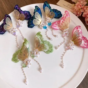 Elegant embroidered butterfly tassel earrings with pearls and zircons for women