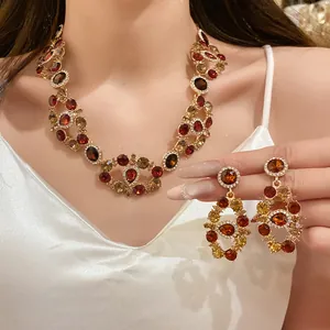 Detailed shot of luxury vintage palace style rhinestone necklace and earrings set