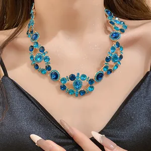 Detailed macro view of high-end vintage blue crystal necklace worn on an elegant Asian model