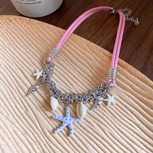 Exquisite detailed view of ocean-themed pink leather necklace with starfish and shell charms