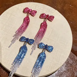 Elegant bowknot tassel earrings with sparkling rhinestones in blue and red colors