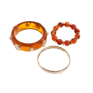 Vintage 3-piece bracelet set with resin bangle, amber beads, and gold ring