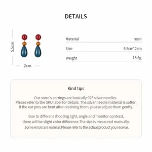 Detailed view of colorful resin teardrop earrings with size and material specifications