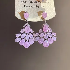 Élégantes boucles d'oreilles à pompons dorées 14 carats avec zircons roses vintage