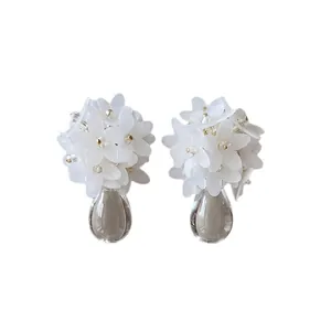 Elegant white flower cluster earrings with clear water-drop pendants in French style