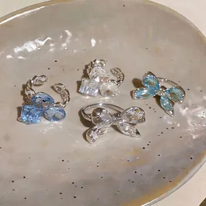 Elegante juego de anillos abiertos con lazo de circón de estilo francés para mujer