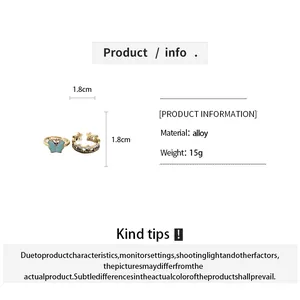 Detailed product info for vintage gold-tone butterfly and star open rings set with dimensions.