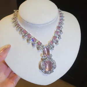 Luxury necklace detail with square pink zircons and intricate floral crystal borders