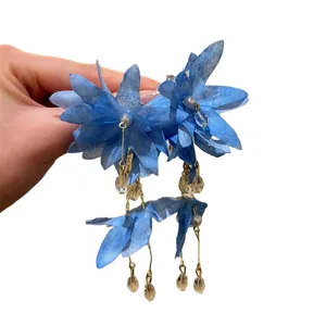 Oversized blue fabric flower tassel earrings for beach vacation style jewelry