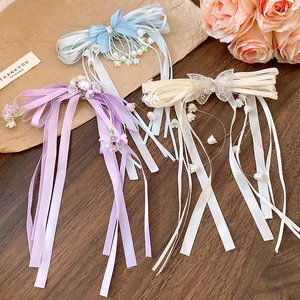 Exquisite sweet ribbon bow hair clips with long tassels and rhinestone butterfly accents