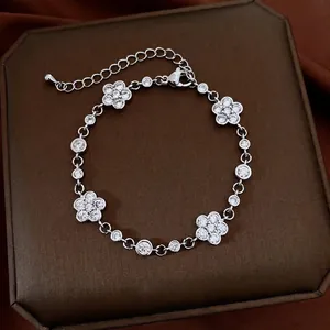 Elegant silver camellia flower bracelet with sparkling zircon stones for luxury jewelry gift