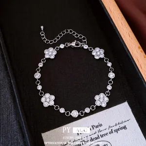 Elegant camellia flower bracelet with moissanite zircon for a vintage luxury look
