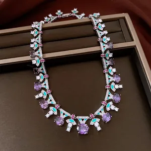 Close-up of vintage luxury necklace with purple zircon and silver-toned intricate design