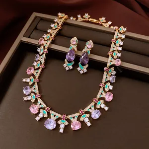 Detailed macro view of a vintage-style jewelry set with zircon necklace and earrings.