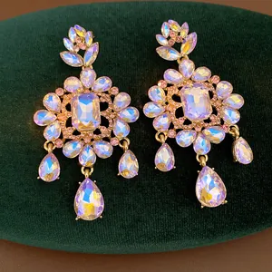 Macro view of exquisite vintage palace style iridescent crystal dangle earrings