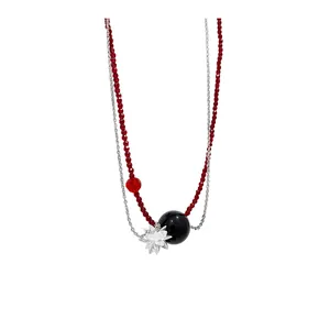 Collana a doppio strato in acciaio inox con perle rosse e ciondolo a fiore