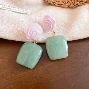 Detail view of New Chinese style resin rose earrings with pale green square pendants